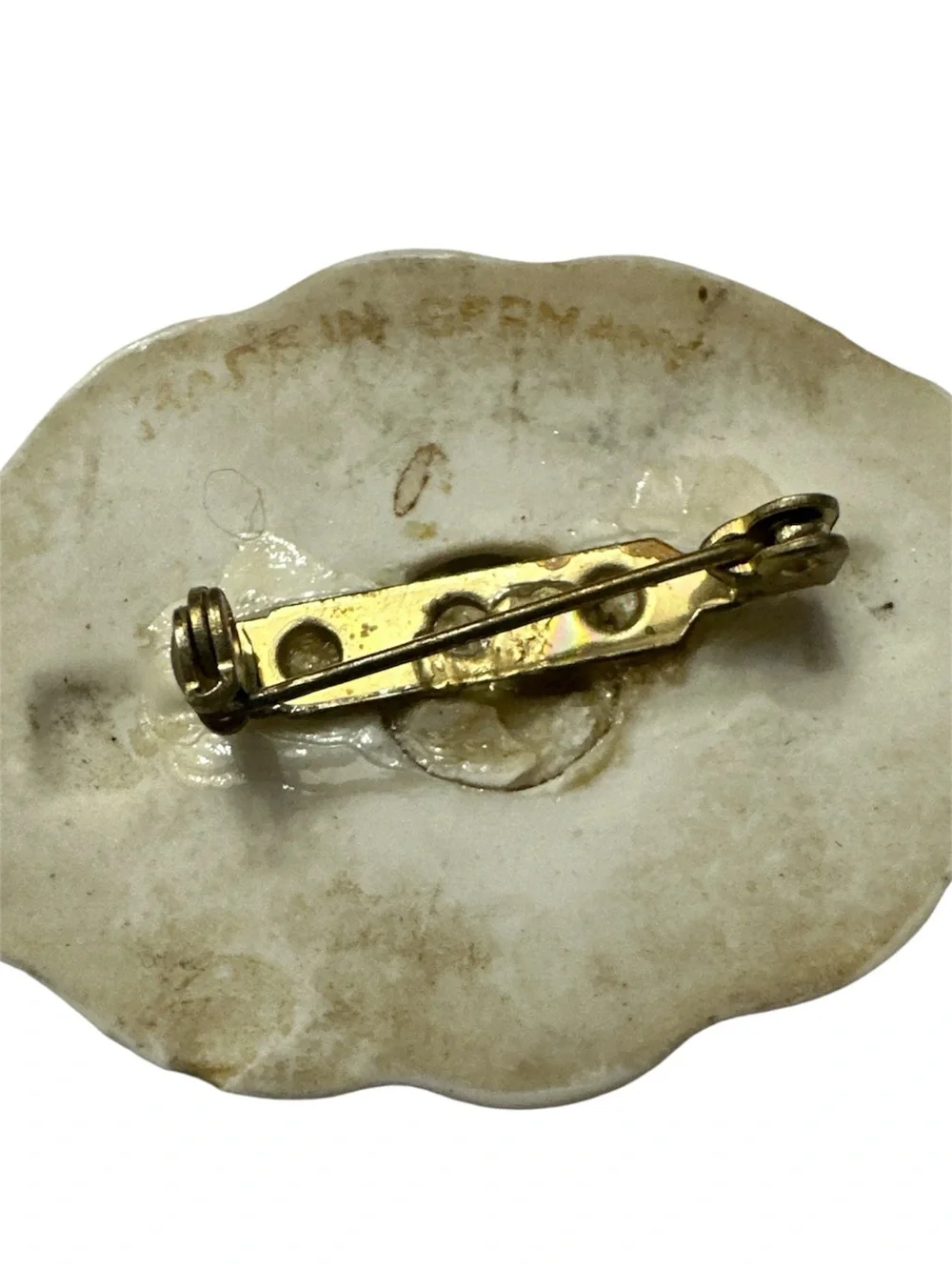 Floral ceramic Brooch with Gold tone Accents - Blue Background